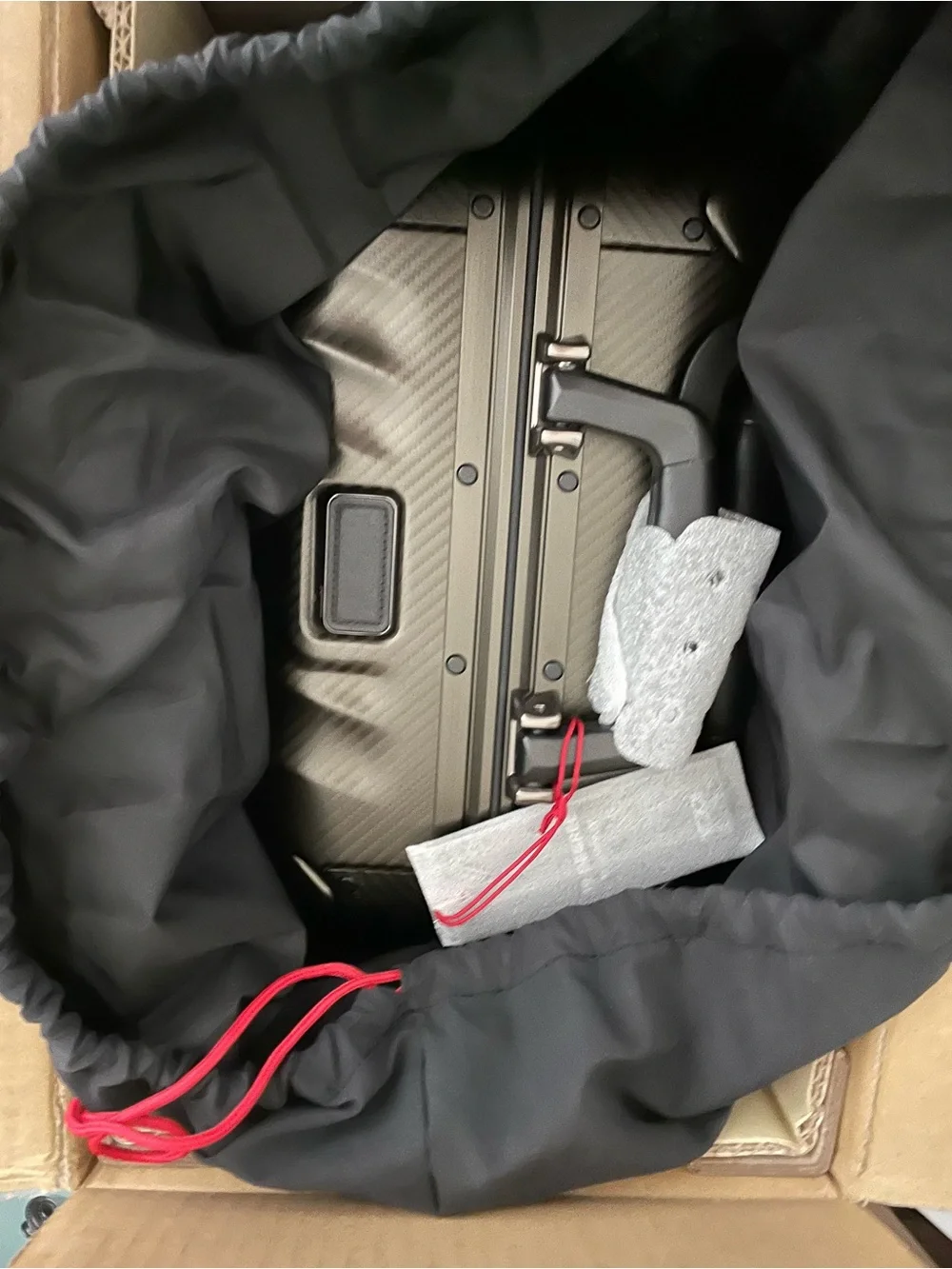 TUMI 19 Degree aluminum carry on.